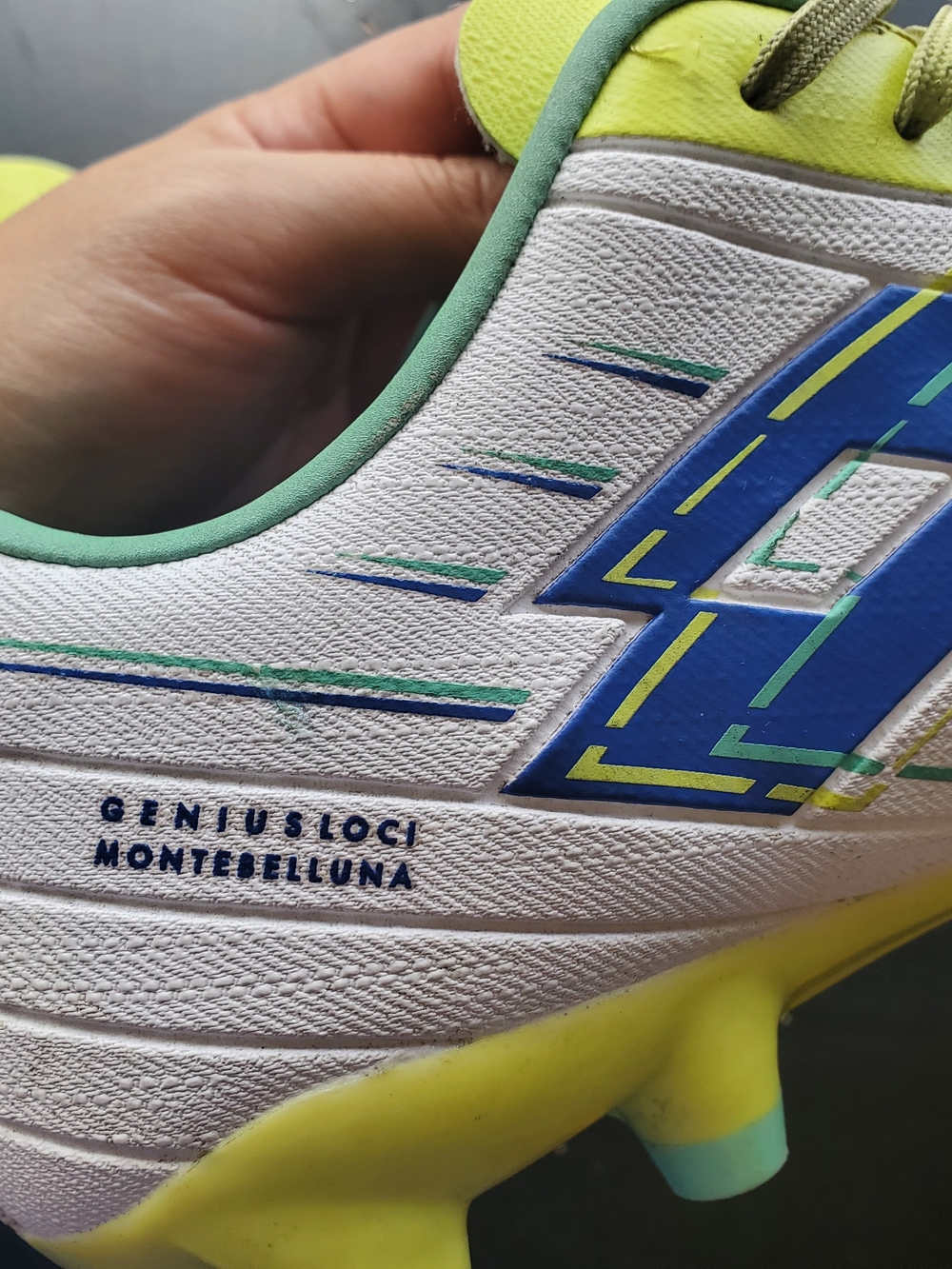 Soccer Cleats in Neon Yellow & White with Blue Accents - Picture 6 of 6